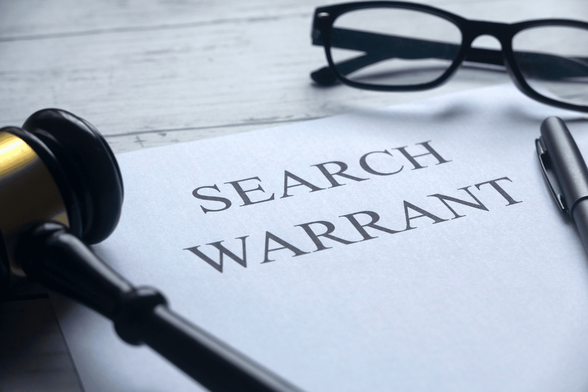 gavel & pen on search warrant document
